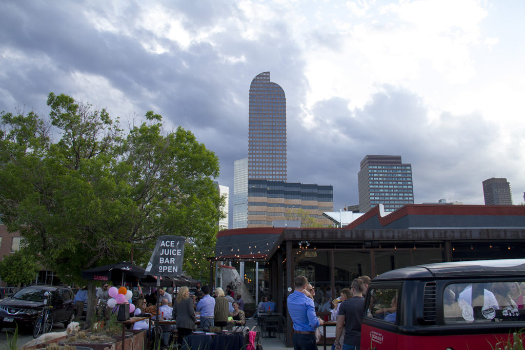 Diners celebrate with libations at Ace on 17th street. (Kevin J. Beaty/Denverite) north capitol hill; uptown; seventeenth; 17th street; ace; ping pong; patio; dining; food; entertainment; bars; restaurants; denver; denverite; colorado; kevinjbeaty