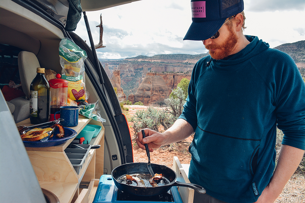The company's retrofitted vans include a kitchen with a stove and sink. (Courtesy Native Campervans)