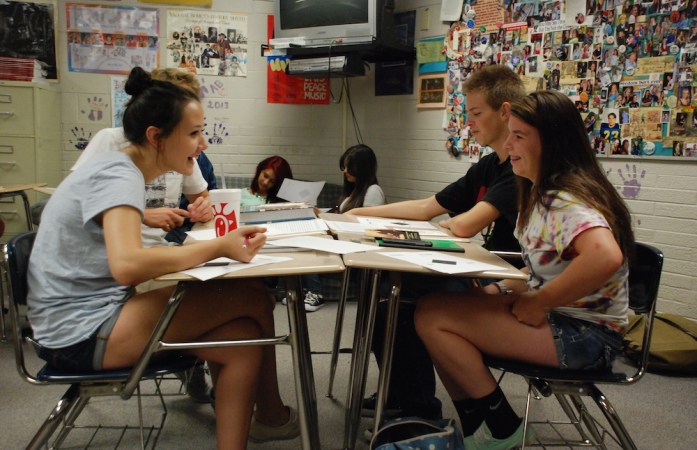 Wheat Ridge High School students discuss a history lesson. (Nicholas Garcia/Chalkbeat)