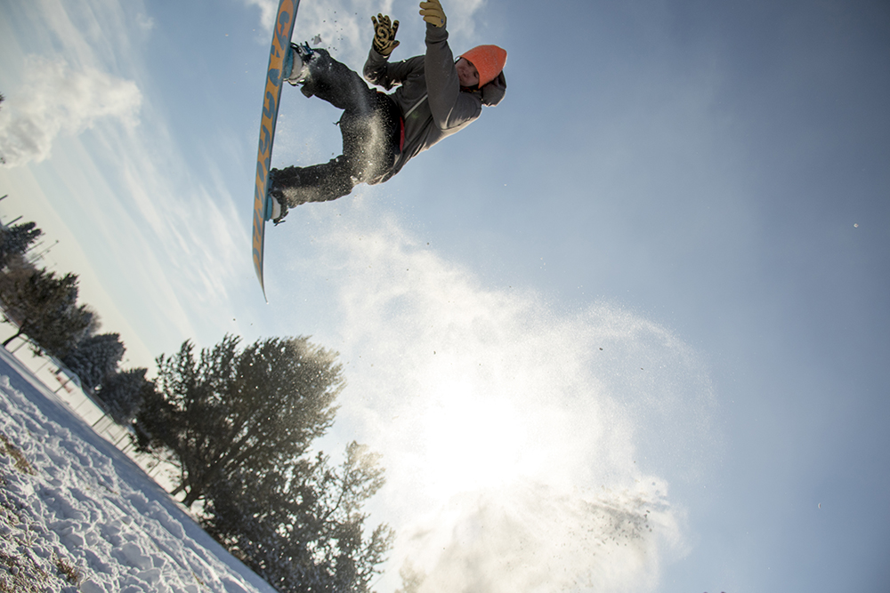 Simon Sheridan flies over a handmade ramp. Dec. 17, 2016. (Kevin J. Beaty/Denverite)
snow day; winter; sledding; denver; denverite; colorado; kevinjbeaty;