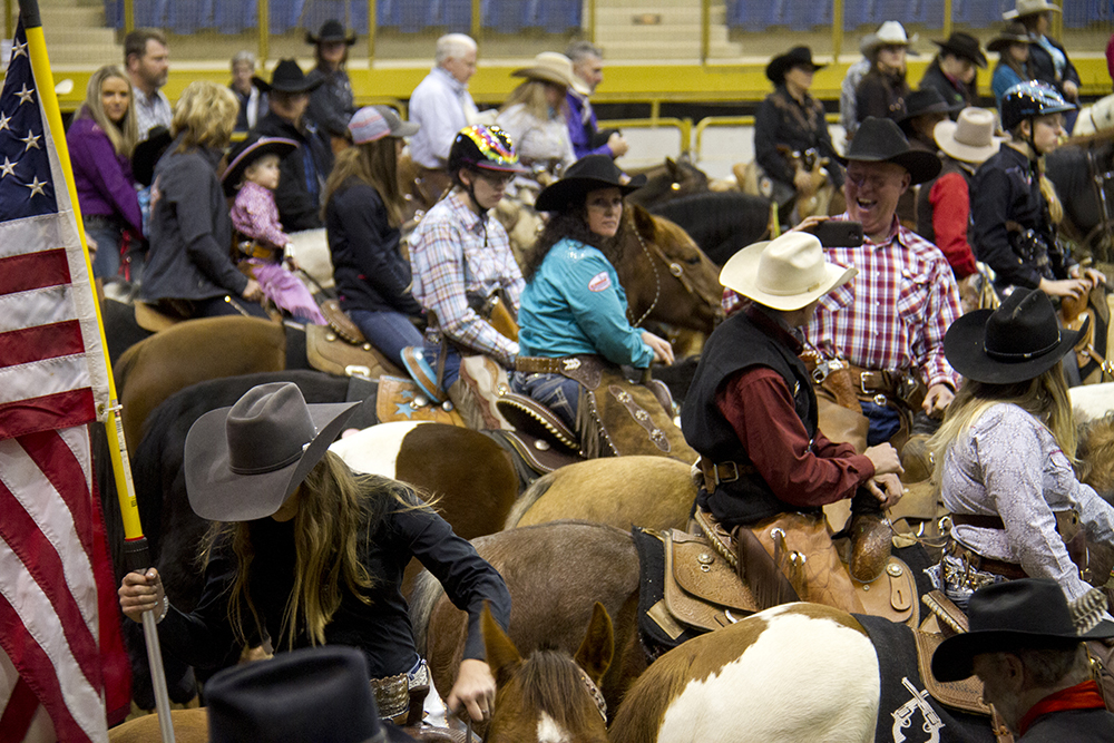 Riders gather before the CMSA Cowboy Mounted Shooting competition. National Western Stock Show. Jan. 8, 2016. (Kevin J. Beaty/Denverite)
national western stock show; nwss; national western center; cowboy; kevinjbeaty; denver; denverite; colorado;