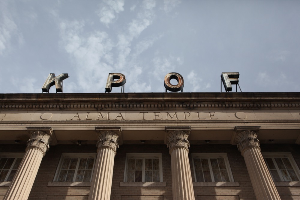Alma Temple is marked by a neon sign spelling KPOF, for the Pillar of Fire radio religious radio station. (Andrew Kenney/Denverite)