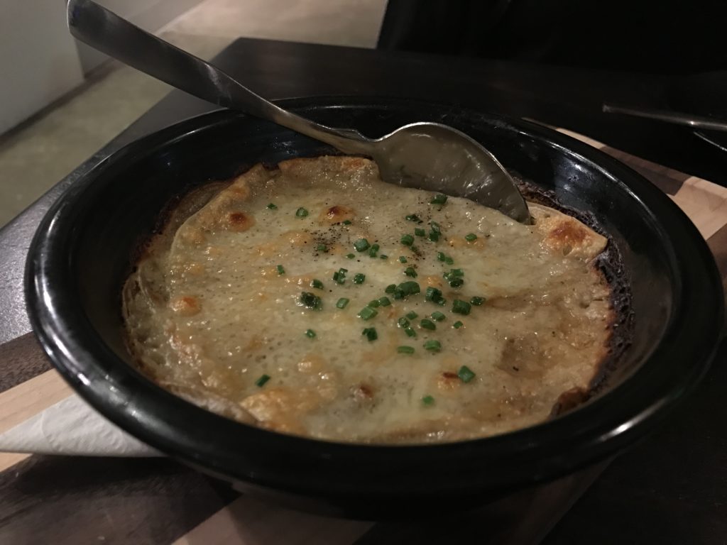 Potato, sunchoke and raclette au gratin at Annette at Stanley Marketplace, 2501 Dallas St.