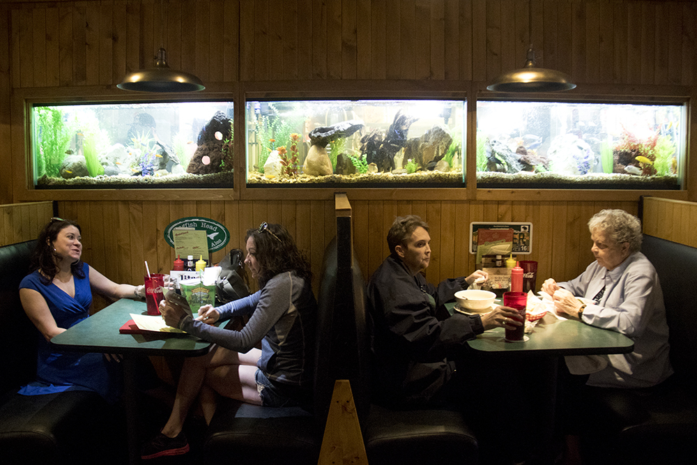 Alli Powell (left to right) and Heather Matthews eat next to the Fisher sisters, Amy and Brenda at the Cherry Cricket. (Kevin J. Beaty/Denverite)
food; restaurant; kevinjbeaty; denver; denverite; colorado; cherry creek; cherry cricket;