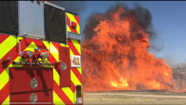 A fire surges with a gust of wind in Parker. (South Metro Fire Rescue)