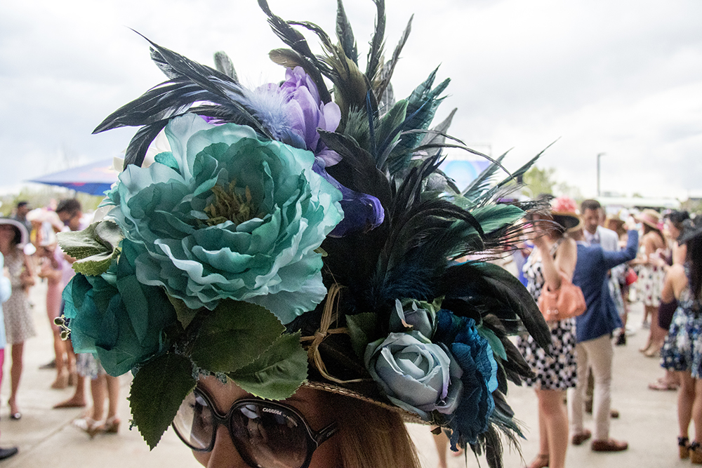 Elle Adelle and her floral hat adorned with a little bird. A Kentucky Derby party at Stanley Marketplace, May 6, 2017. (Kevin J. Beaty/Denverite)
stanley marketplace; kentucky derby; aurora; kevinjbeaty; denverite; colorado;