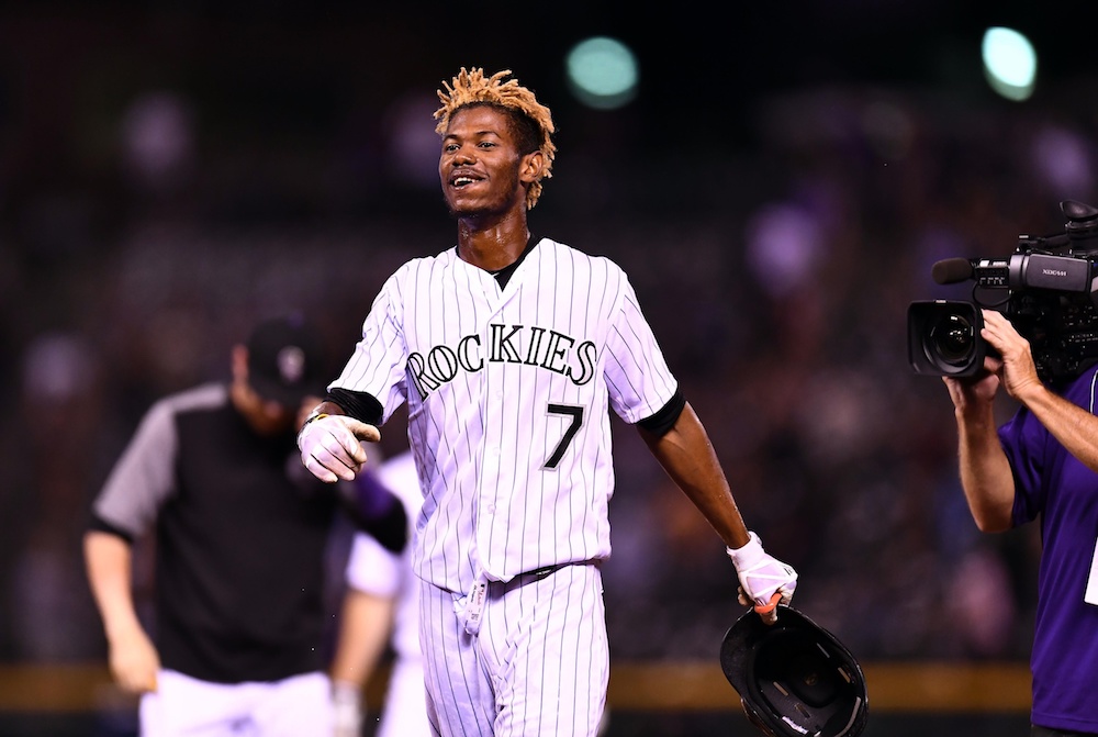 Raimel Tapia's ninth-inning RBI preserved a Rockies' win Thursday. (Ron Chenoy/USA Today Sports)