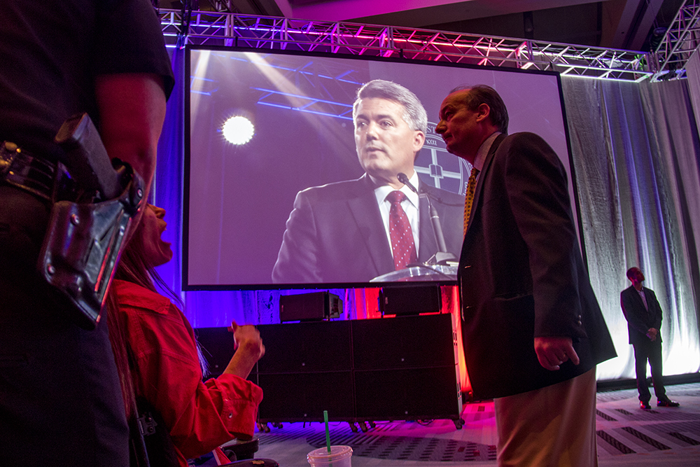 Dawn Russell interrupts Cory Gardner's speech at the Western Conservative Summit, July 21, 2017. (Kevin J. Beaty/Denverite) western conservative summit; wcs; protest; cory gardner; healthcare; adapt; medicaid; denver; denverite; kevinjbeaty;