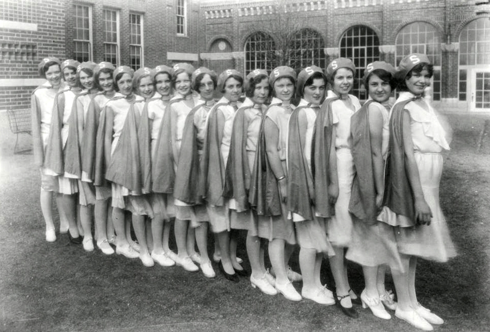 Members of the Denver, Colorado South High School Pep Club Drill Team pose in their uniforms for a team photograph. (Denver Public Library/Western History Collection/WH1990)
high school; denver public library; dpl; archive; history;