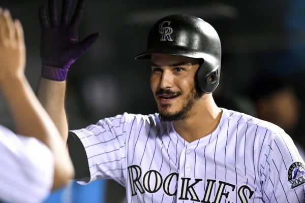 Nolan Arenado celebrates after his three-run shot. (Ron Chenoy/USA Today Sports)