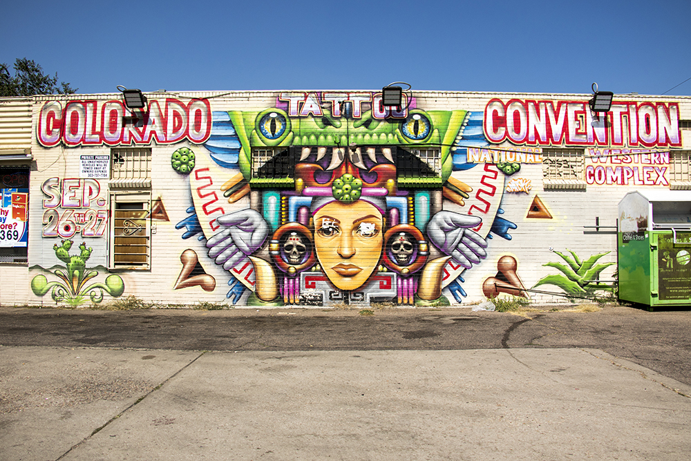 A mural on the side of Sportsmans Liquor in Villa Park, Sept. 11, 2017. (Kevin J. Beaty/Denverite)