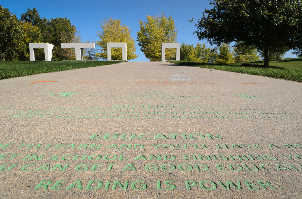 Inscriptions on the path leading to Northside Park (Austin Cope/For Denverite) parks; park; Northside Park; Globeville; sal carpio