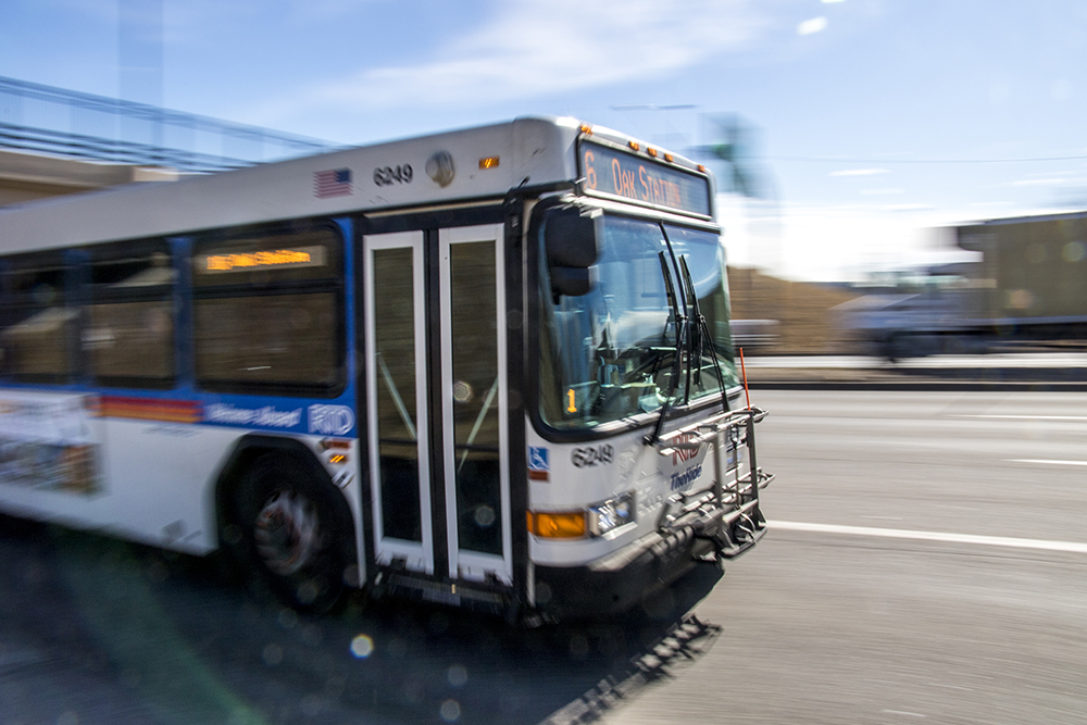 An RTD bus drives through the Colfax Avenue cloverleaf at Federal Boulevard, Feb. 6, 2018. (Kevin J. Beaty/Denverite)