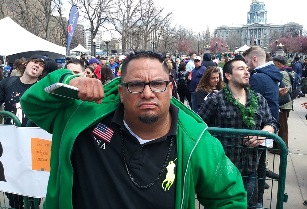 Miguel Lopez, former permit holder for Denver's annual 420 festival, poses for a portrait. April 20, 2018. (Kevin J. Beaty/Denverite)
420; stoner; denver; denverite; colorado; kevinjbeaty;