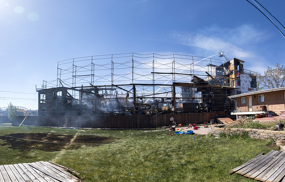The Denver Fire department sprays water on a construction site that burned down at 1930 Grove Street, May 10, 2018. (Kevin J. Beaty/Denverite)
denver; colorado; denverite; kevinjbeaty; firefighting; fire; construction;