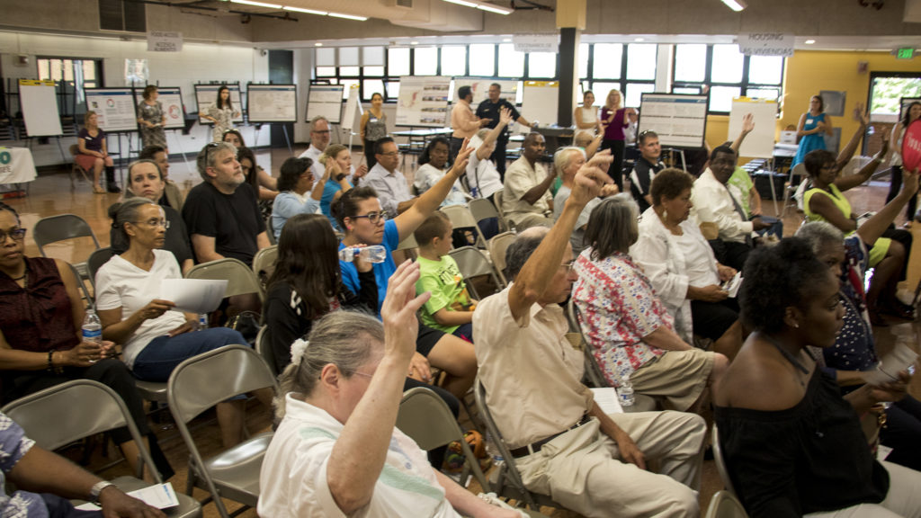 A meeting for comments on an early draft of the Far Northeast Area Plan at the Montbello campus cafeteria, July 12, 2018. (Kevin J. Beaty/Denverite)