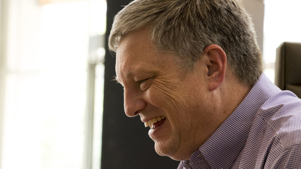 Secretary of State Wayne Williams speaks with a reporter in the Wells Fargo building on Broadway, which houses his office, July 18, 2018. (Kevin J. Beaty/Denverite)