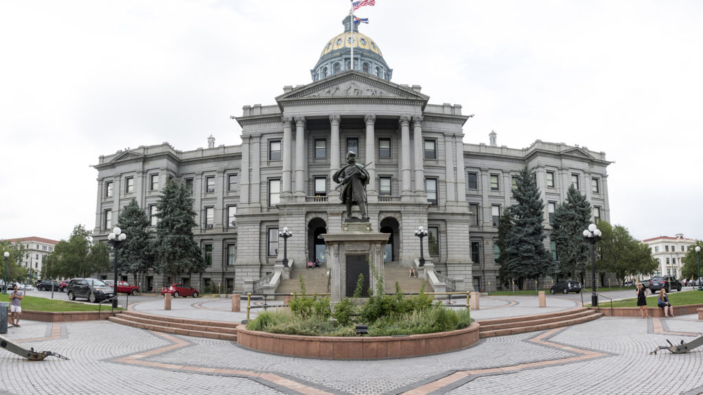 A monument to the Civil War, that includes a reference to the Sand Creek Massacre, in front of the State Capitol building, July 23, 2018. (Kevin J. Beaty/Denverite)