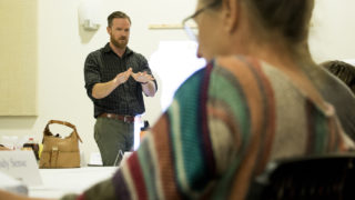 Curt Upton, Denver's principal city planner, leads a meeting with stakeholders to devise the East Area Plan for neighborhoods along East Colfax Avenue, July 26, 2018. (Kevin J. Beaty/Denverite)