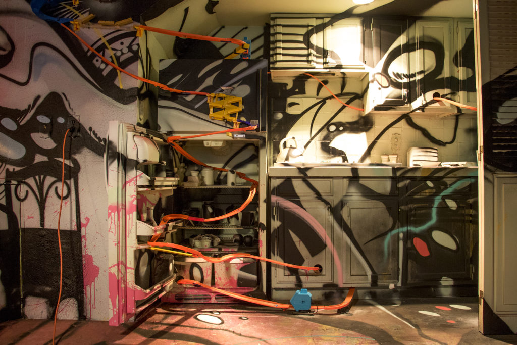 Hot Wheels car tracks snake around "This Machine Has A Soul," an art installation by Warm Cookies of the Revolution meant to get people thinking about participatory budgeting, Aug. 15, 2018. (Kevin J. Beaty/Denverite)