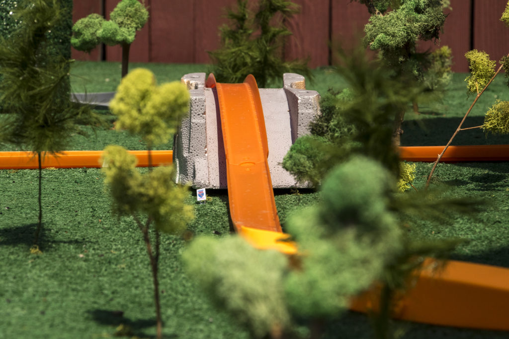 Hot Wheels car tracks snake around "This Machine Has A Soul," an art installation by Warm Cookies of the Revolution meant to get people thinking about participatory budgeting, Aug. 15, 2018. (Kevin J. Beaty/Denverite)