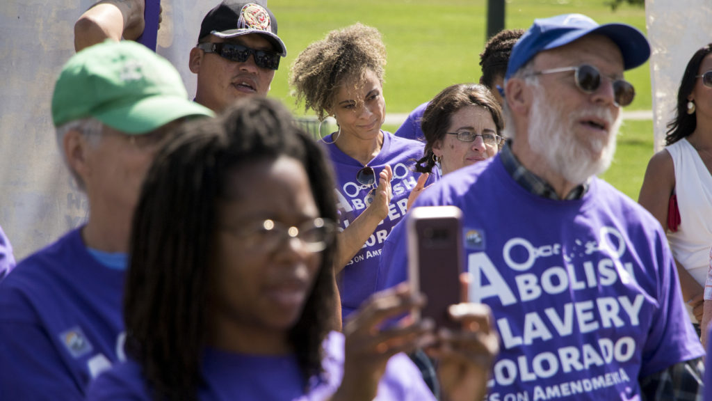 Elisabeth Epps attends a rally to vote "yes" on Amendment A, to make slavery unconstitutional in Colorado, at City Park, Aug. 28, 2018. (Kevin J. Beaty/Denverite)