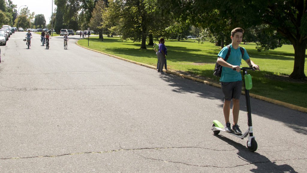 A dockless scooter in action at City Park, Aug. 28, 2018. (Kevin J. Beaty/Denverite)