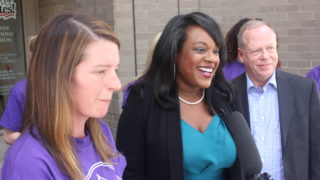 Rep. Leslie Herod (center) on August 2, when Caring 4 Denver dropped off signatures for their ballot measure. (Courtesy Caring 4 Denver)