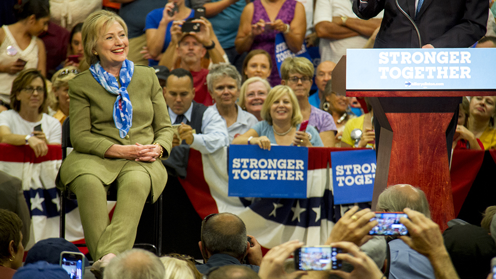 John Hickenlooper and Hillary Clinton at a rally in Commerce City. August 3, 2016. (Kevin J. Beaty/Denverite)