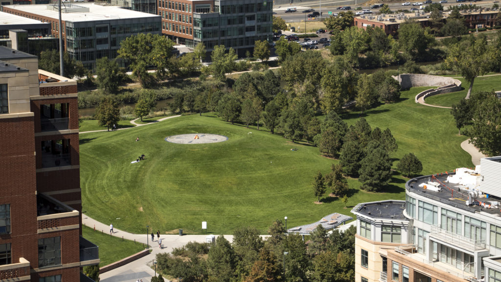 The hill in Commons Park known colloquially as "stoner hill," seen from atop the DaVita Kidney Care building downtown, Sept. 9, 2018. (Kevin J. Beaty/Denverite)