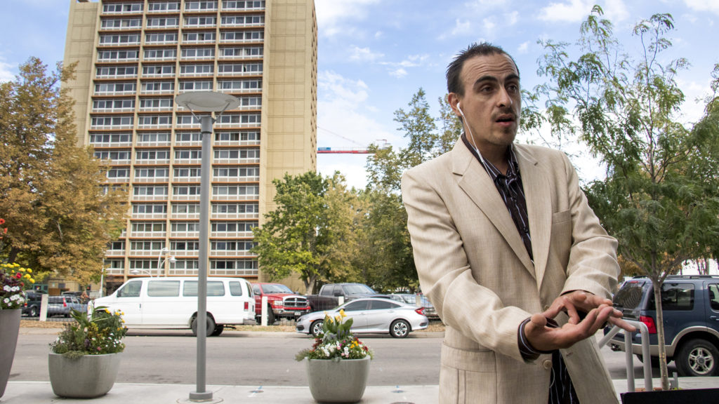 District 3 City Council candidate David Roybal speaks to a reporter at a Starbucks by Sloan's Lake, Sept. 19, 2018. (Kevin J. Beaty/Denverite)