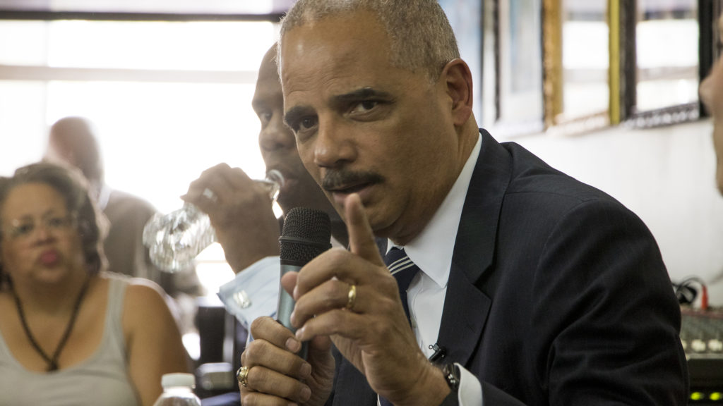 Former Attorney General Eric Holder speaks on a panel at Brother Jeff's Cultural Center in Five Points, Sept. 27, 2018. (Kevin J. Beaty/Denverite)