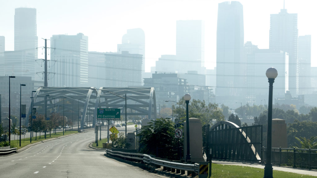 Particles hang over Denver during a winter inversion, Oct. 12, 2018. (Kevin J. Beaty/Denverite)