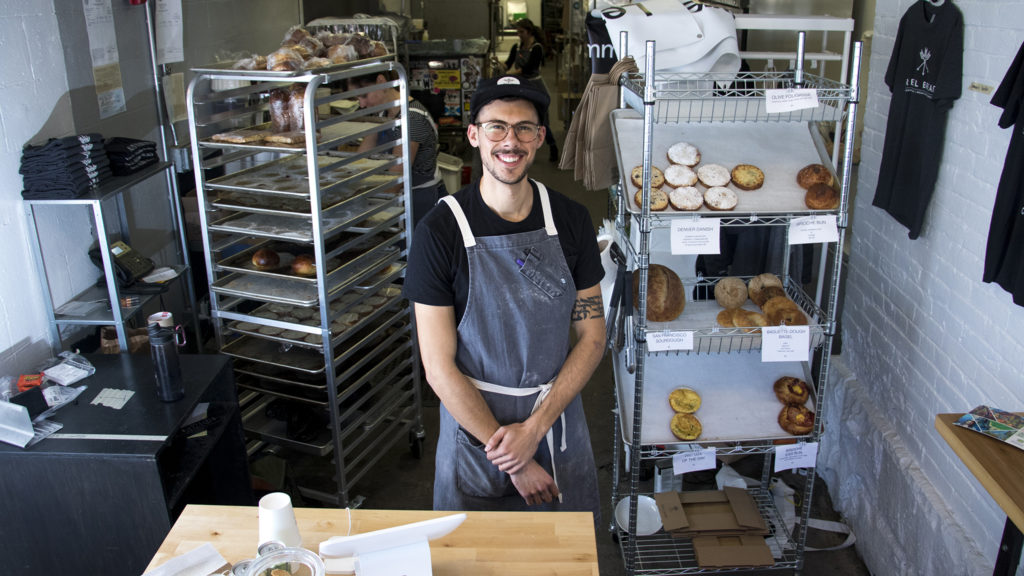 Zach Martinucci, cofounder and head baker of Rebel Bread bakery in Five Points, poses for a portrait. Oct. 17, 2018. (Kevin J. Beaty/Denverite)