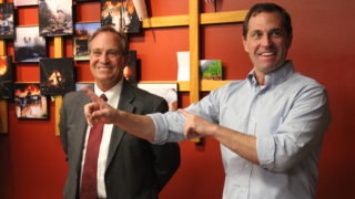 Jason Crow (right) stands next to U.S. Rep. Rep. Ed Perlmutter during a campaign stop at Aurora Fire Department Station 8 on Monday, Oct. 15, 2018. (Esteban L. Hernandez/Denverite)