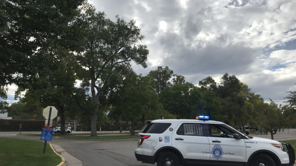 Denver Police outside the Denver Zoo after it was shut down due to a credible threat Oct. 2, 2018. (Esteban L. Hernandez/Denverite)