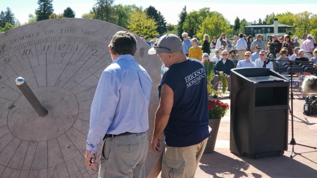 Crowd gathers as people take a look at the recently completed sundial at Cranmer Park. (Allan Tellis/ Denverite)