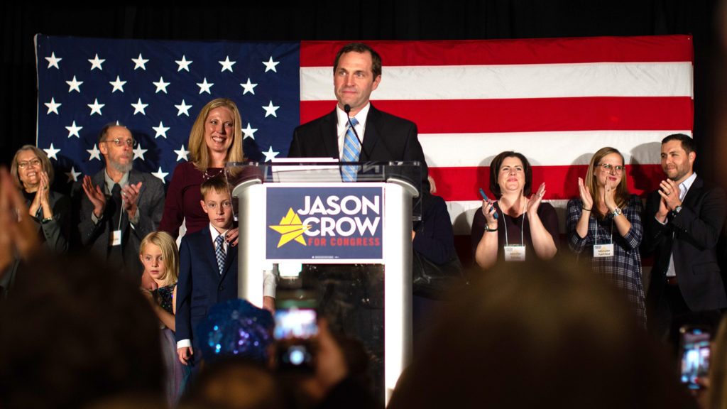 Jason Crow addresses the crowd after he is declared the winner of a hotly contested campaign in Colorado's 6th Congressional District. (Kirsten Leah Bitzer/For Denverite)