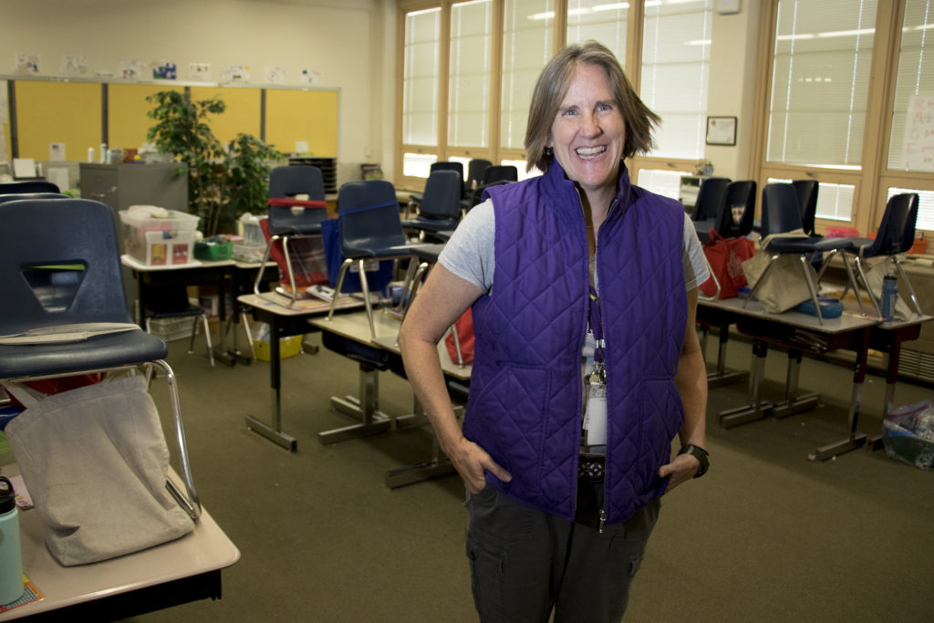 Kate Tynan-Ridgeway poses for a portrait in the classroom where she teaches at Brown Elementary School, Nov. 16, 2018. (Kevin J. Beaty/Denverite)
