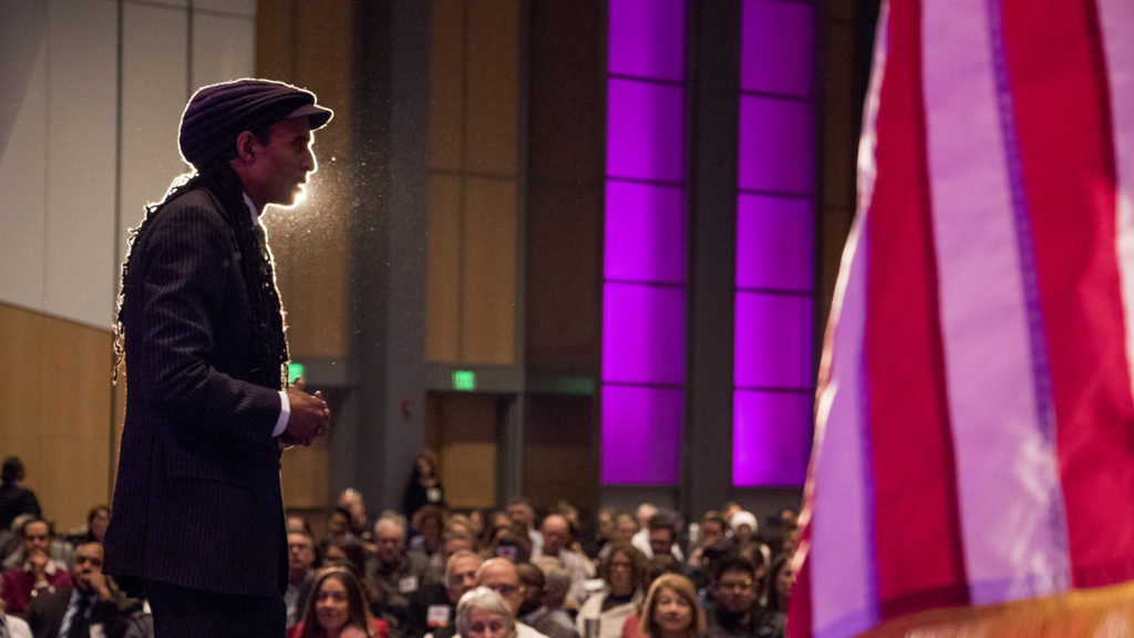 Mustafa Santiago Ali, vice president of climate, environmental justice and community revitalization for the Hip Hop Caucus, speaks during the 2018 Sustainable Denver Summit at the Colorado Convention Center, Nov. 29, 2018. (Kevin J. Beaty/Denverite)