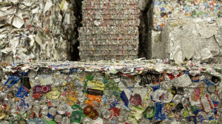 Giant bales of recycled material inside the Altogether Recycling center in Globeville, Dec. 3, 2018. (Kevin J. Beaty/Denverite)