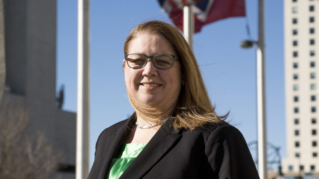 Denver Clerk and Recorder candidate Peg Perl poses for a portrait outside the Wellington Webb Municipal Building, Dec. 4, 2018. (Kevin J. Beaty/Denverite)
