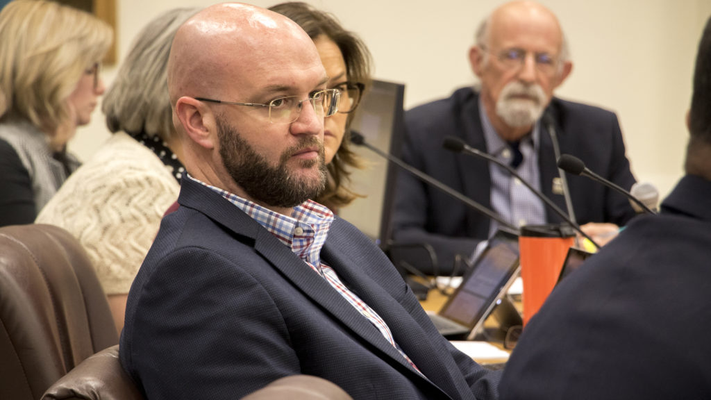 Councilman Jolon Clark listens during a Safety, Housing, Education, & Homelessness Committee meeting discussing expanded powers for the Office of the Independent Monitor, Jan. 16, 2019.