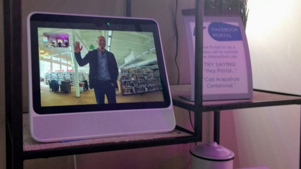 Arapahoe Libraries Executive Director Oliver Sanidas on the screen of a Facebook Portal in the Interaction Lab, an exhibition at the Southglenn branch on strategies to make homes comfortable and accessible for all ages and abilities. (Donna Bryson/Denverite)