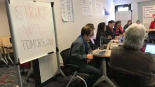Denver Public Schools officials and Denver Classroom Teachers Association members meet during negotiating on Friday, Jan. 18, 2019, at the Acoma Campus in Denver. (Esteban L. Hernandez/Denverite)