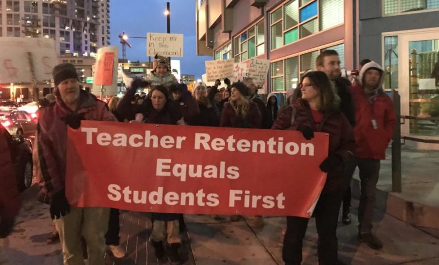 Denver teachers rally for more pay outside a school board meeting on Jan. 24, 2019. (Melanie Asmar/Chalkbeat)