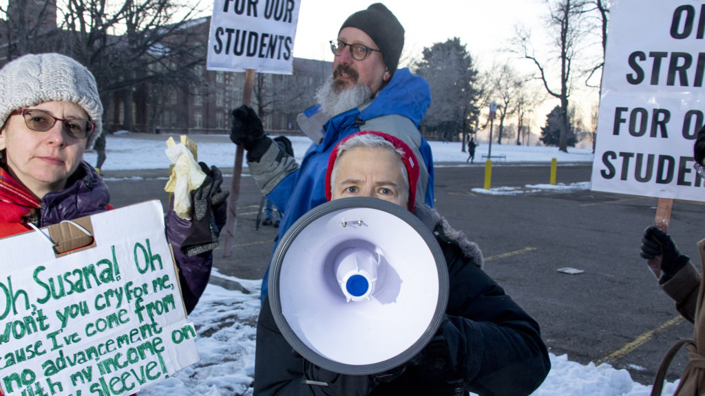 Bernie Janelle, a special education teacher at South High School, leads chants on the first day of the Denver teachers' strike outside of South High School, Feb. 11, 2019. (Kevin J. Beaty/Denverite)
