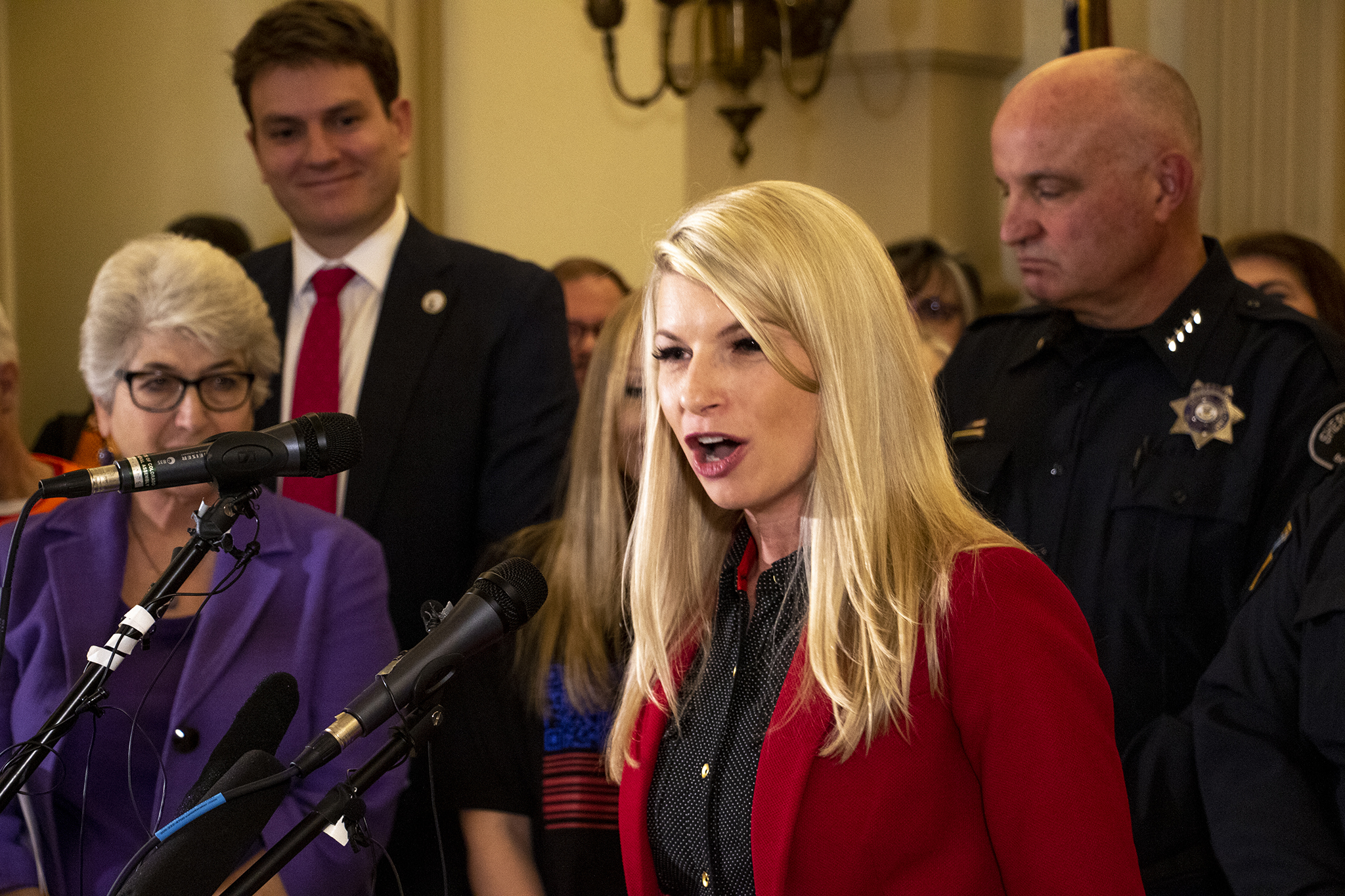 State District 22 Sen. Brittany Pettersen speaks at a press conference for a 