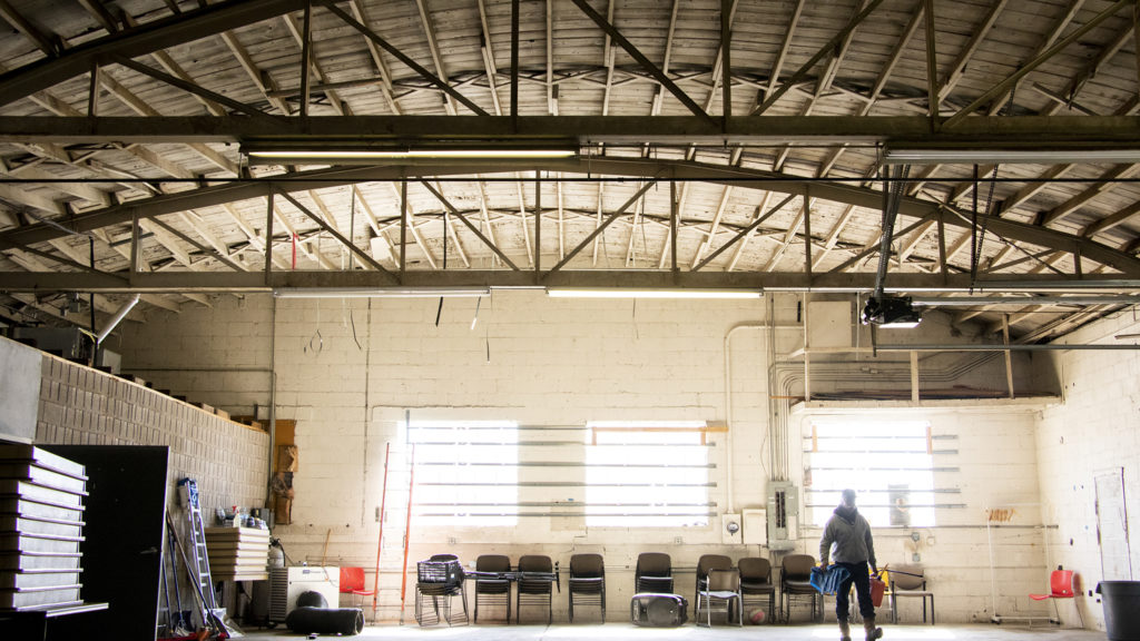 David de Santiago, farm manager with Re:Vision, inside the old Westwood food co-op, Feb. 20, 2019. (Kevin J. Beaty/Denverite)