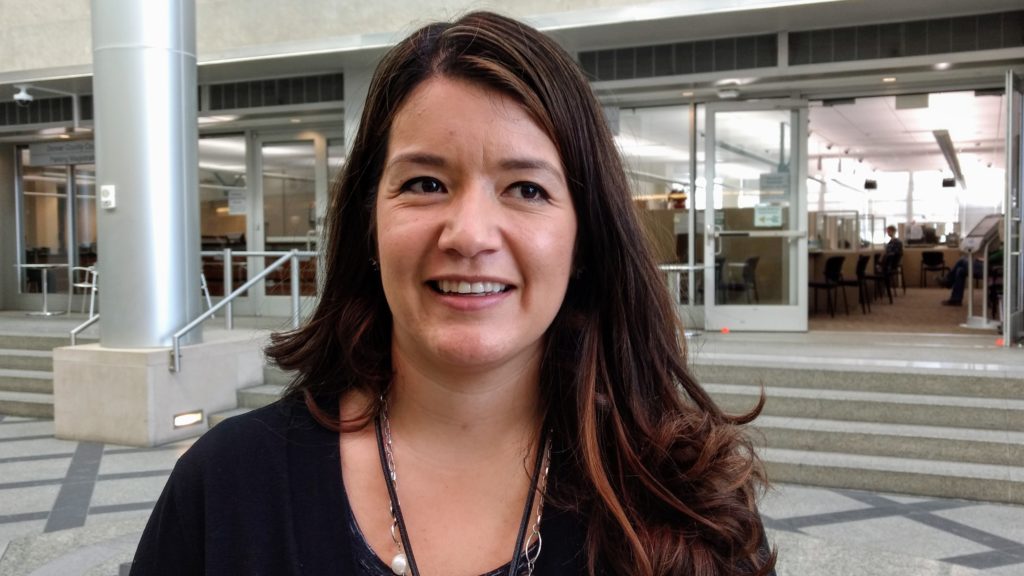 Ann Padilla-Parras, a juvenile diversion officer for the Denver district attorney, shares her story of growing up in a Habitat house. (Donna Bryson/Denverite)